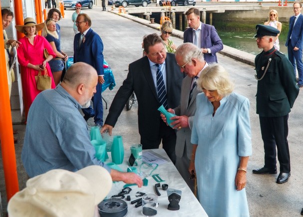 Falconer presenting the company at Newlyn harbour in early 2022 to the King, then Prince of Wales, and Camilla, then Duchess of Cornwall